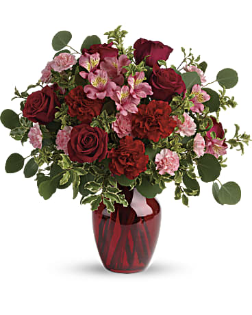 Blooming Belles - Tres belle! Ruby red roses and delicate pink alstroemeria are mixed with whimsical greens in a radiant vase for a beautifully blooming gift she'll never forget! 
