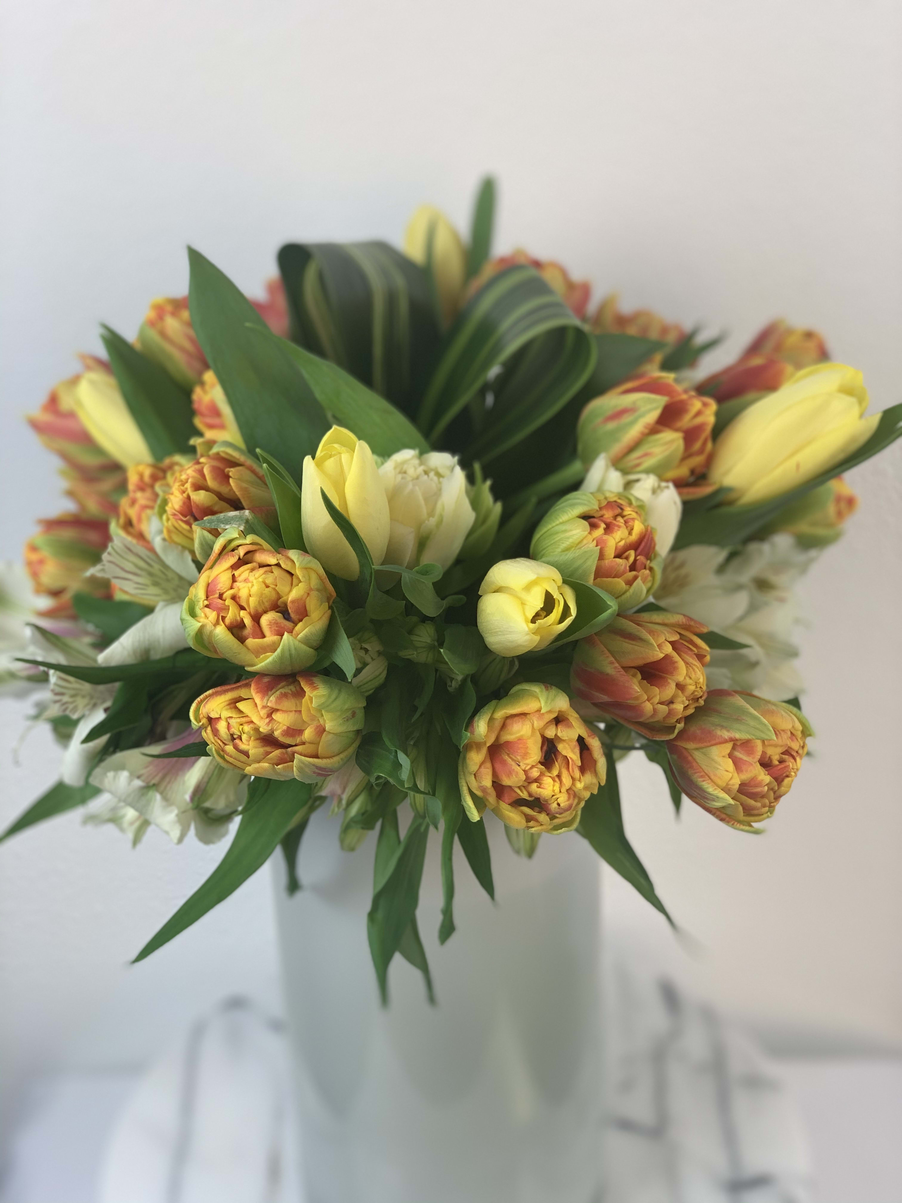Spring designs  - Spring flowers make your hear sing! Ranunculus, tulips, peony blooms and a design that is one of a kind. Nothing that leaves the studio is exactly the same. Spring flowers available February- May. 