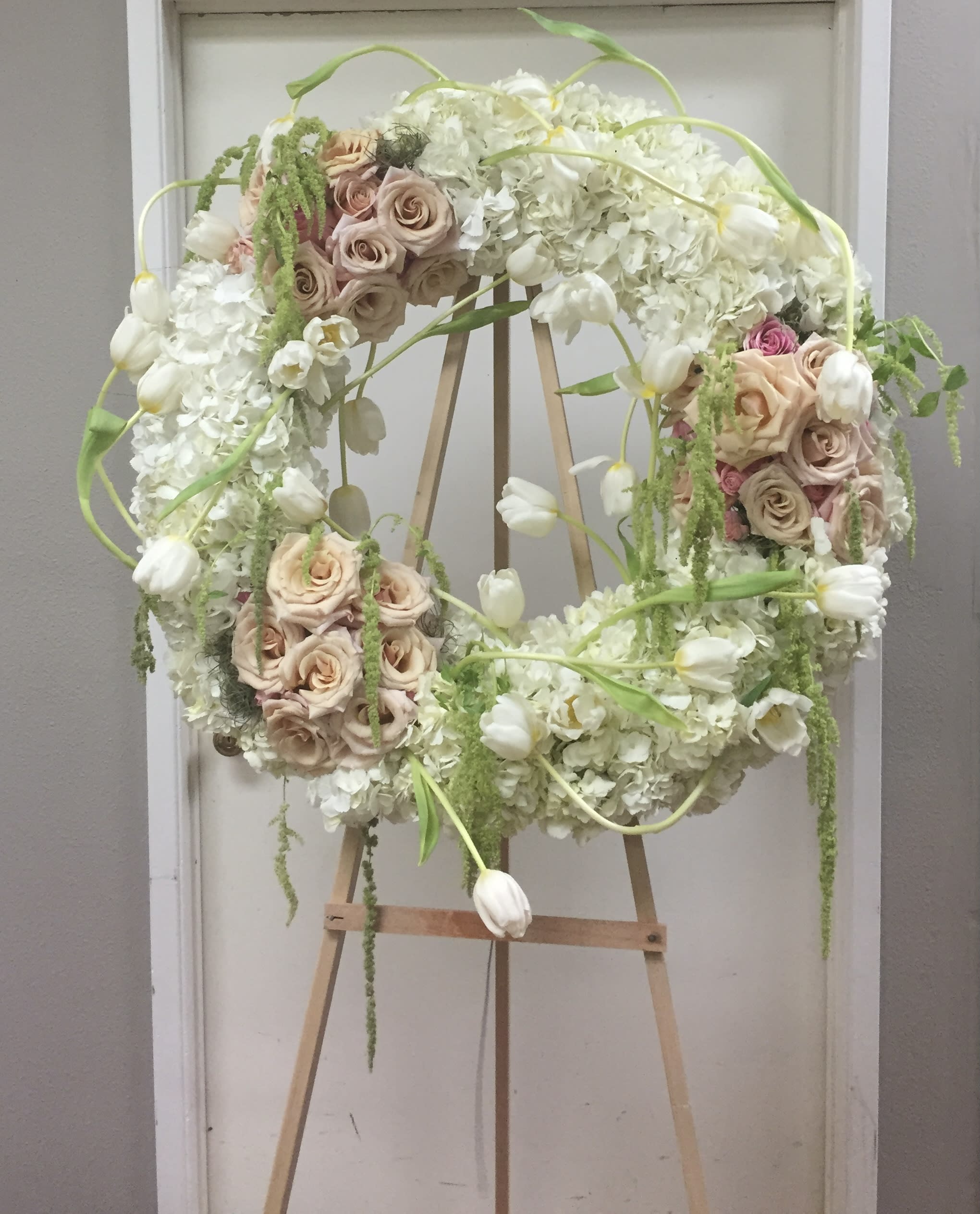 Funeral 1 Funeral 1 - White and pink mix on a round stand.