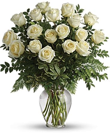 Pure Love Roses Boquest - Pure white roses take center stage in this chic bouquet, delivered with stylish greens in a classic urn vase.