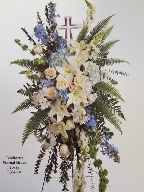 Eturnal Grace Spray - Beautiful collection of blue and white flowers with a keepsake crystal cross