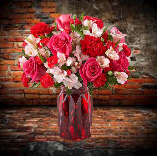 Adore You Bqt - Fall in love at first sight with our Adore You™ Bouquet. Beautifully designed with hot pink roses, red carnations and pink alstroemeria,