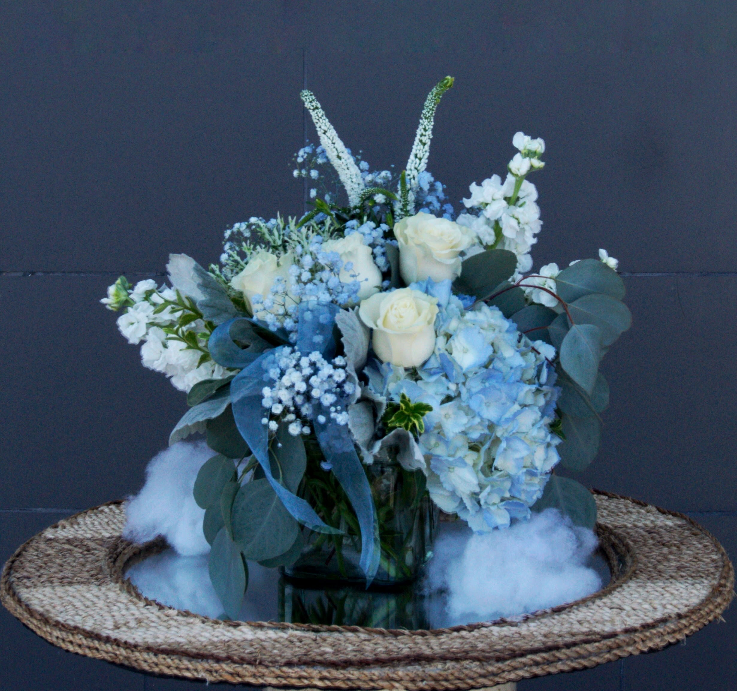 Clouds n Sky - Pretty design including hydrangea, rose, fragrant stock and accents in a glass container.