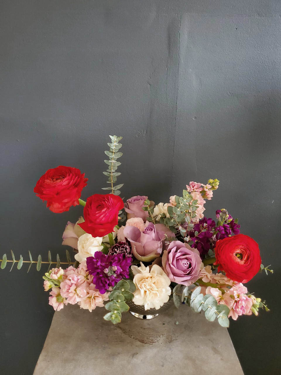 ILY ILY - A soft arrangement of lavender and red ranunculus. SO romantic and rich with textures.