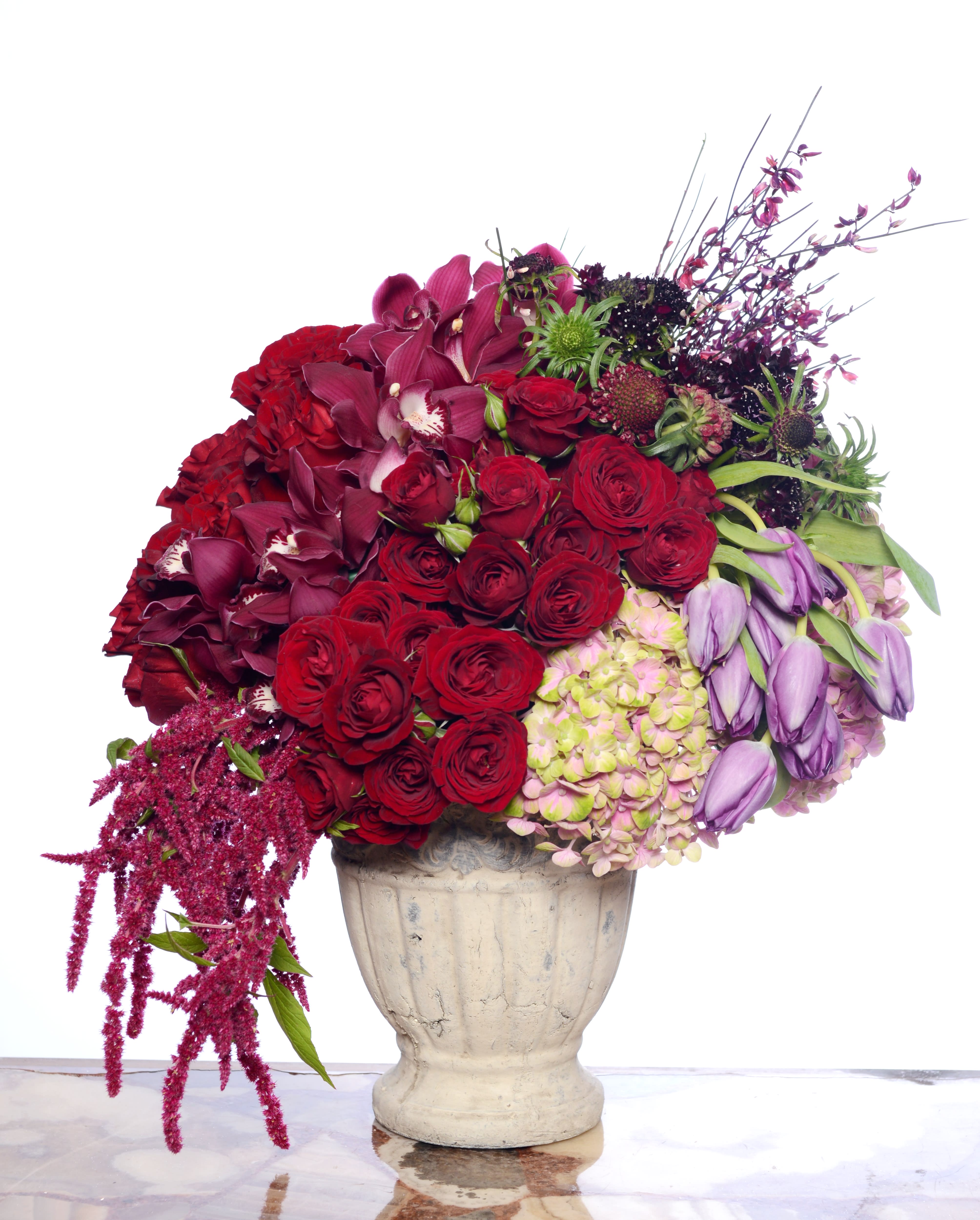 Love Me Love Me - Composed of roses ,hydrangeas, tulips ,spray roses, amaranthus ,orchids, scapiosa