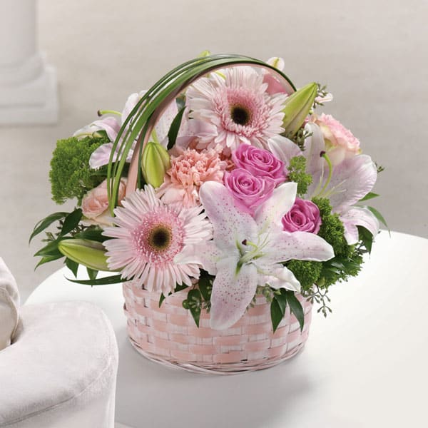 Basket Of Love - When you have a truly special Mom, she deserves this truly stunning basket of roses, Oriental lilies, trachelium and more!