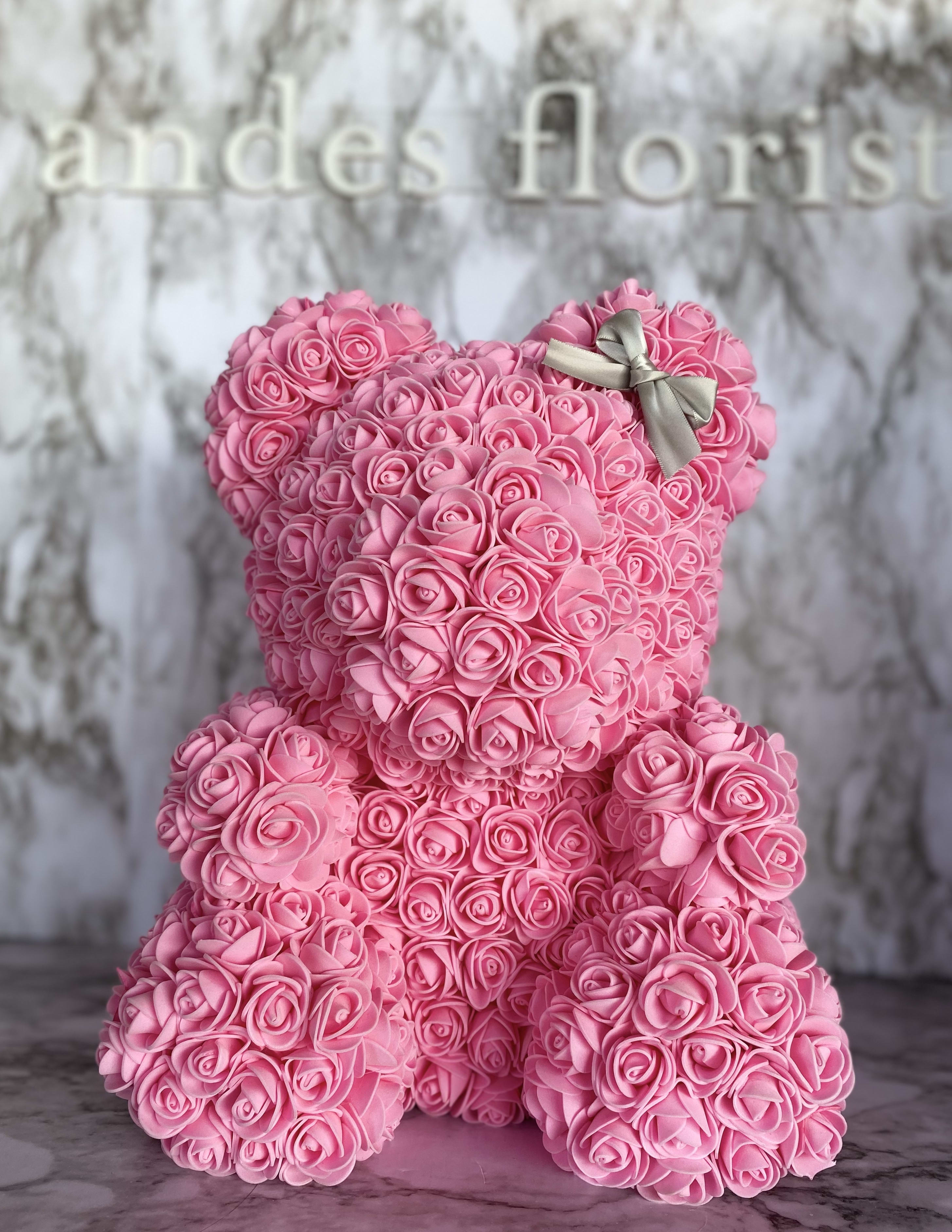a teddy bear made of roses