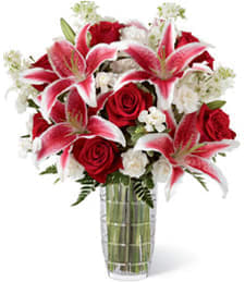 The Stars Above - A cheerful and vibrant assortment of colorful flowers, this exquisite arrangement brims with charm and beauty! Sure to light up any room, these blissful blooms will make a simply splendid and delightfully darling Valentine's Day gift!