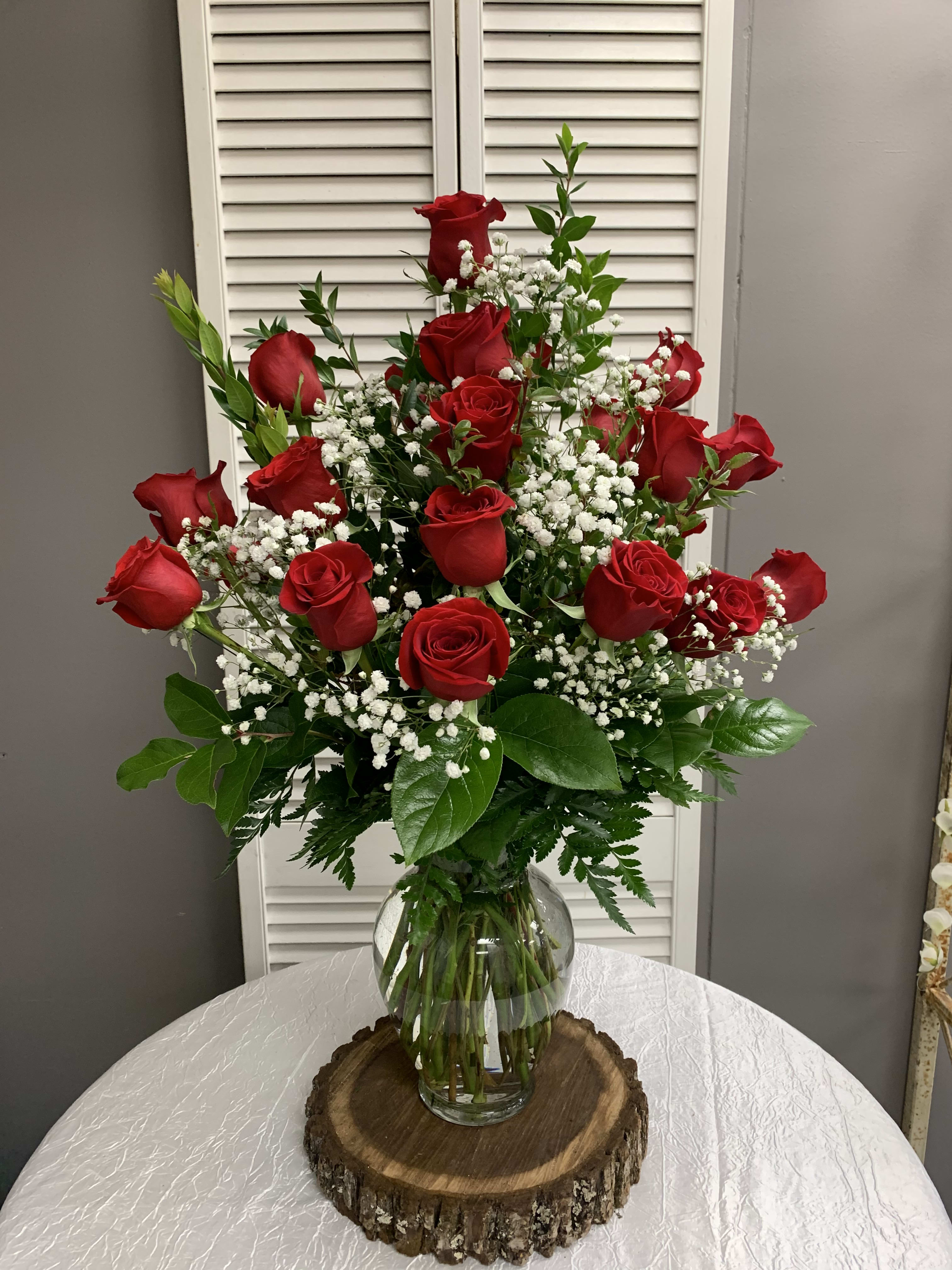 Two Dozen Red Roses Arranged With A Filler Flowers In Saint Louis Mo