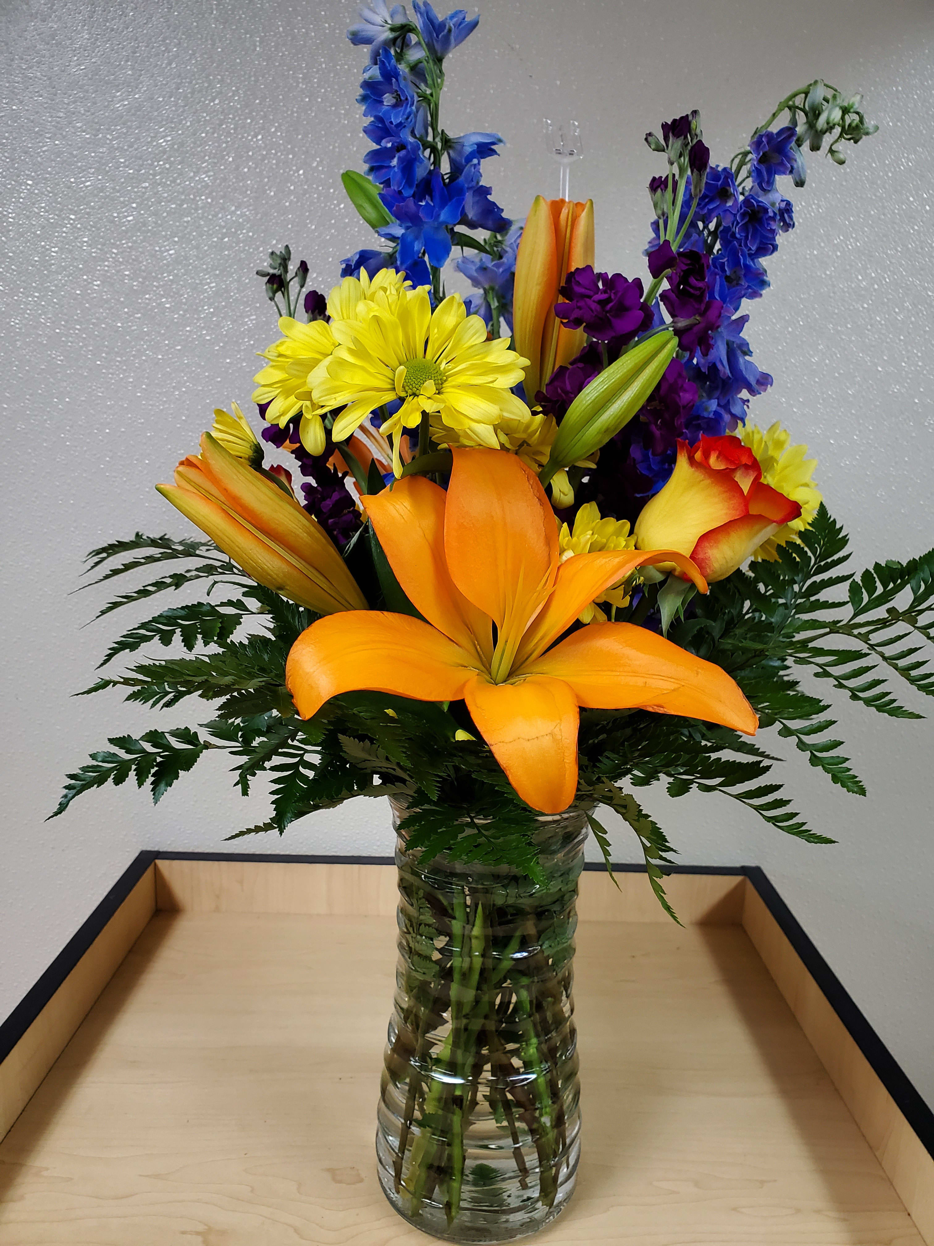 Mixed Color Arrangement Mixed Color Arrangement - Lilies, Roses, Stock, delphinium, carnations