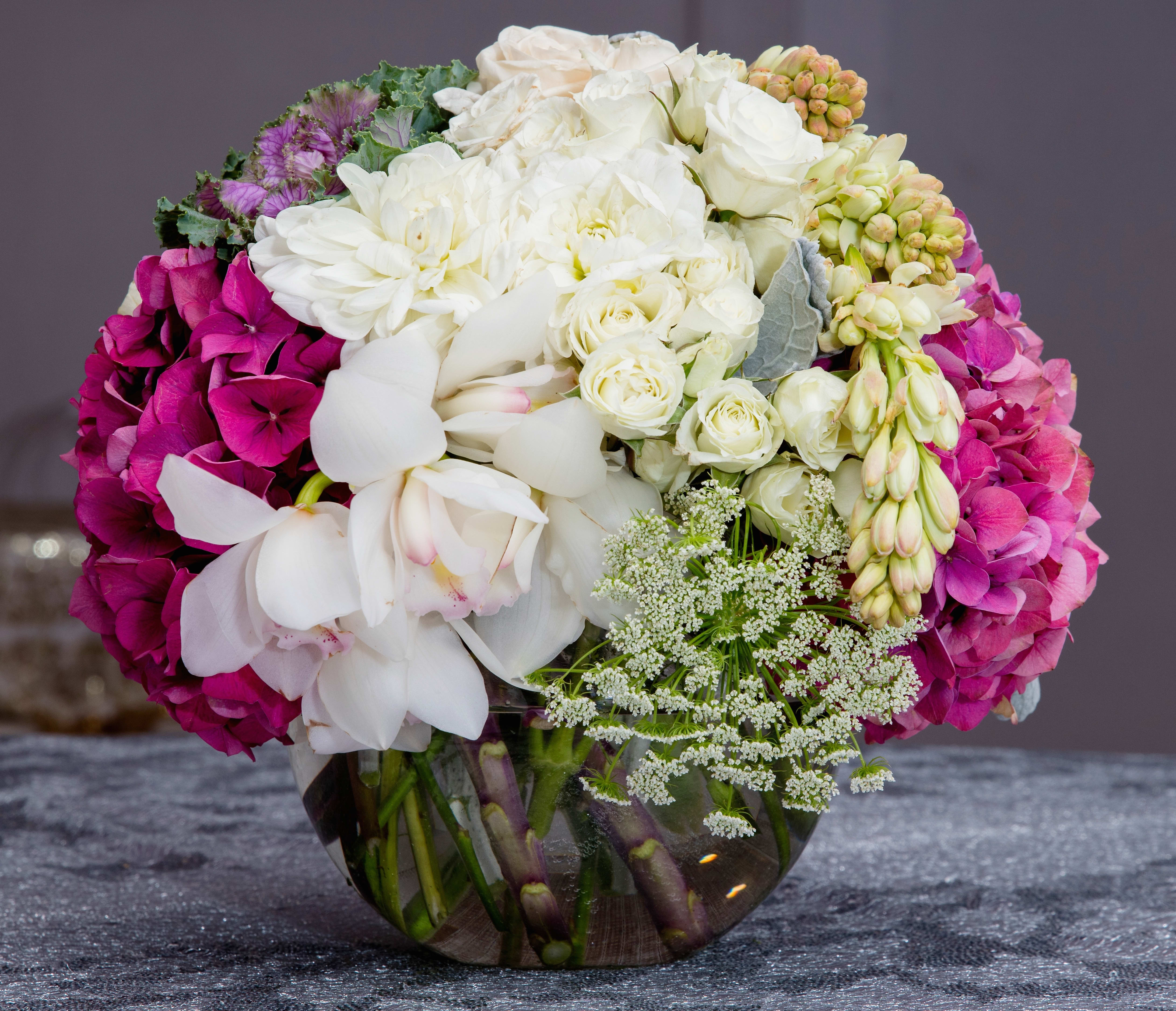 Precious Blooms Precious Blooms - Composed of Orchids, Spray Roses, Hydrangeas, Dahlias, Queen Lace.