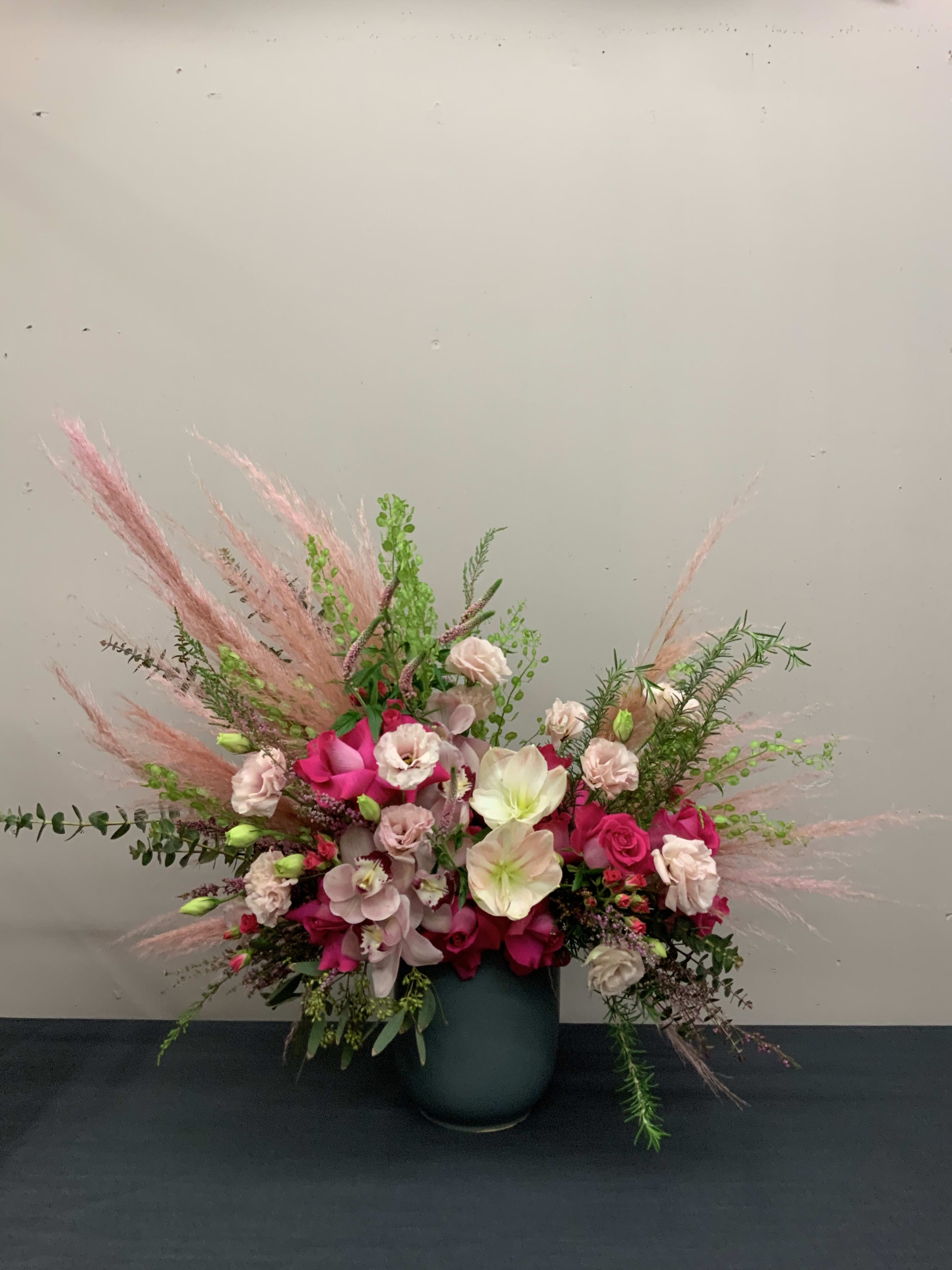 Rhythm of Love - Bohemian style arrangement with the most beautiful textures and flowers chosen by our best designers for one elegant look. 