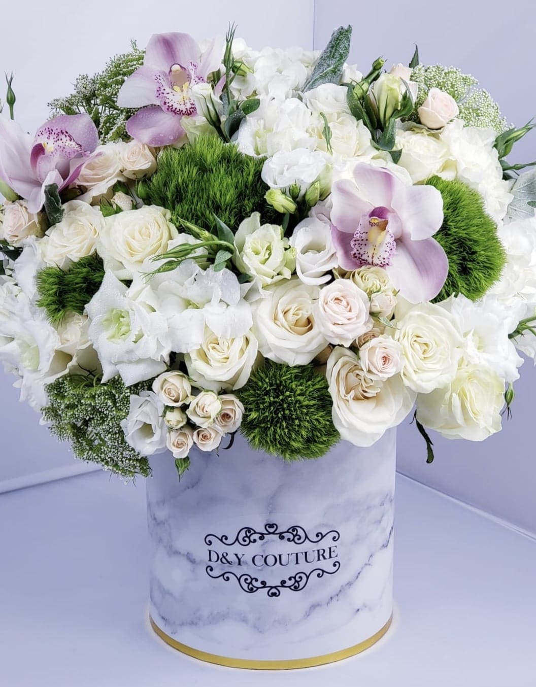 Daniela - Bright and lovely flower mix for the bright and lovely people in your life.   Substitution Policy: In some instances, the florist photo may represent an overall theme or look and include a one-of-a-kind vase which cannot be exactly replicated. Although the actual bouquet may not precisely match the photo, its temperament will. Occasionally, substitutions of flowers or containers happen due to weather, seasonality and market conditions which may affect availability. If this is the case with the gift you've selected, the local florist will ensure that the style, theme and color scheme of your arrangement is preserved and will only substitute items of equal or higher value. 