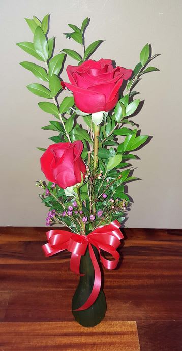 Red Roses In Vase By Artistic Ambiance