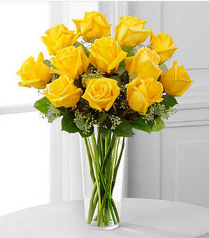 The Yellow Rose Bouquet  - Sunny yellow roses are a cheery and wonderful gift. Celebrate a birthday, anniversary, graduation or any occasion with this lively bouquet of roses with seeded eucalyptus in a clear glass vase. GOOD bouquet is approximately 19&quot;H x 15&quot;W. Your purchase includes a complimentary personalized gift message.