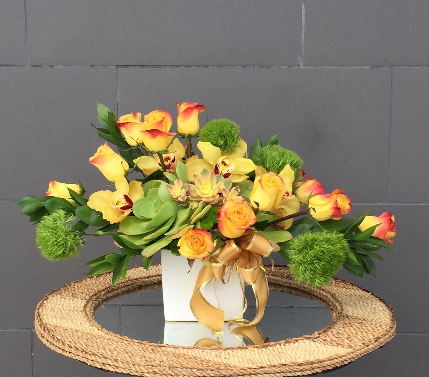 Sunny Desert - Cheerful design including roses, orchids, green balls, succulents and nice accents.