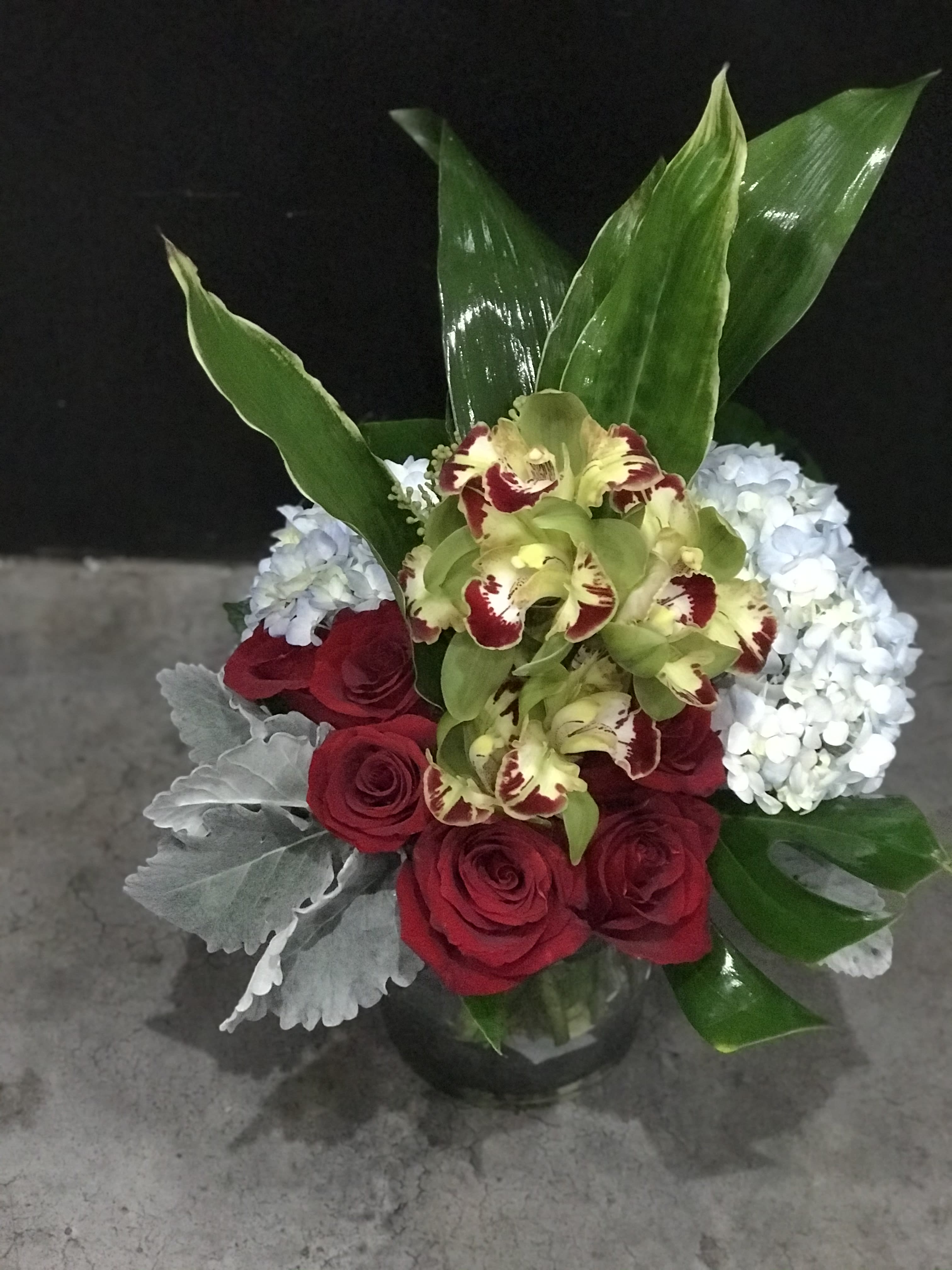 Cymbidium Surprise - Cymbidium Orchids, Red Roses, Hydrangeas, Dusty Miller