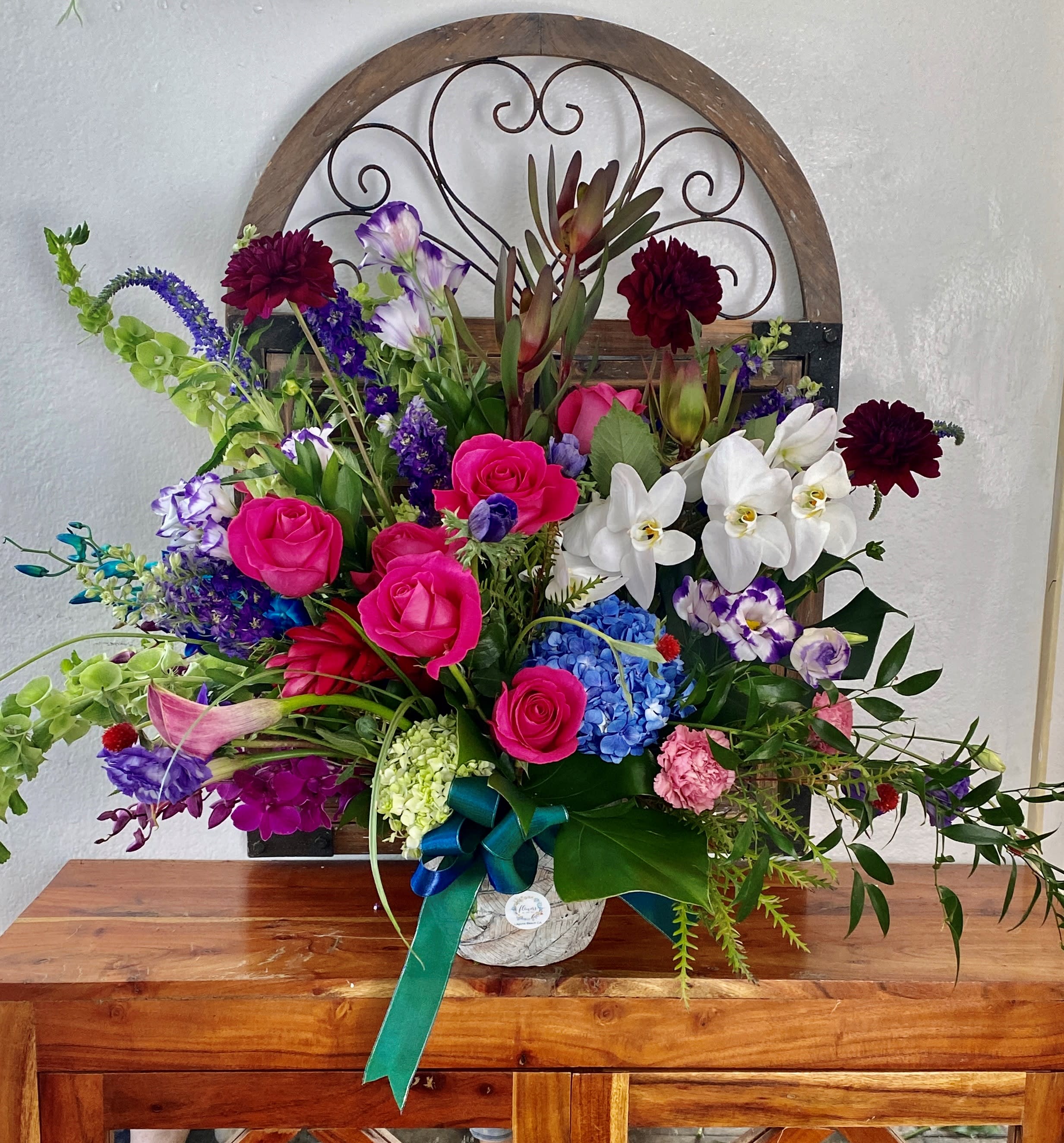 Fairytale  - Wonderful arrangement with magic colors in rustic container.