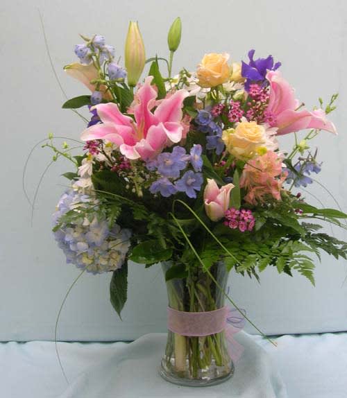 Just Sweet Pastel Mixed Flowers Just Sweet Pastel Mixed Flowers - Lilies, hydrangea, roses, delphinium and alstromeria whisper a soft message.