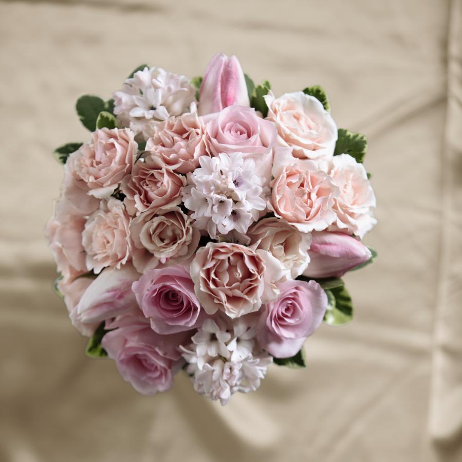 FTD Dawn Rose Bouquet - The FTDÂ® Dawn Roseâ¢ Bouquet is a display of blushing sweetness full of  feminine charm. Pink roses, tulips, spray roses and hyacinth are brought  together to form a bouquet that is both eye-catching and elegant tied  together with a pink satin ribbon for a complete look. GOOD bouquet  includes 13 stems. Approx. 7-inches in diameter. BETTER bouquet includes  20 stems. Approx. 8-inches in diameter. BEST bouquet includes 27 stems.  Approx. 9-inches in diameter. 