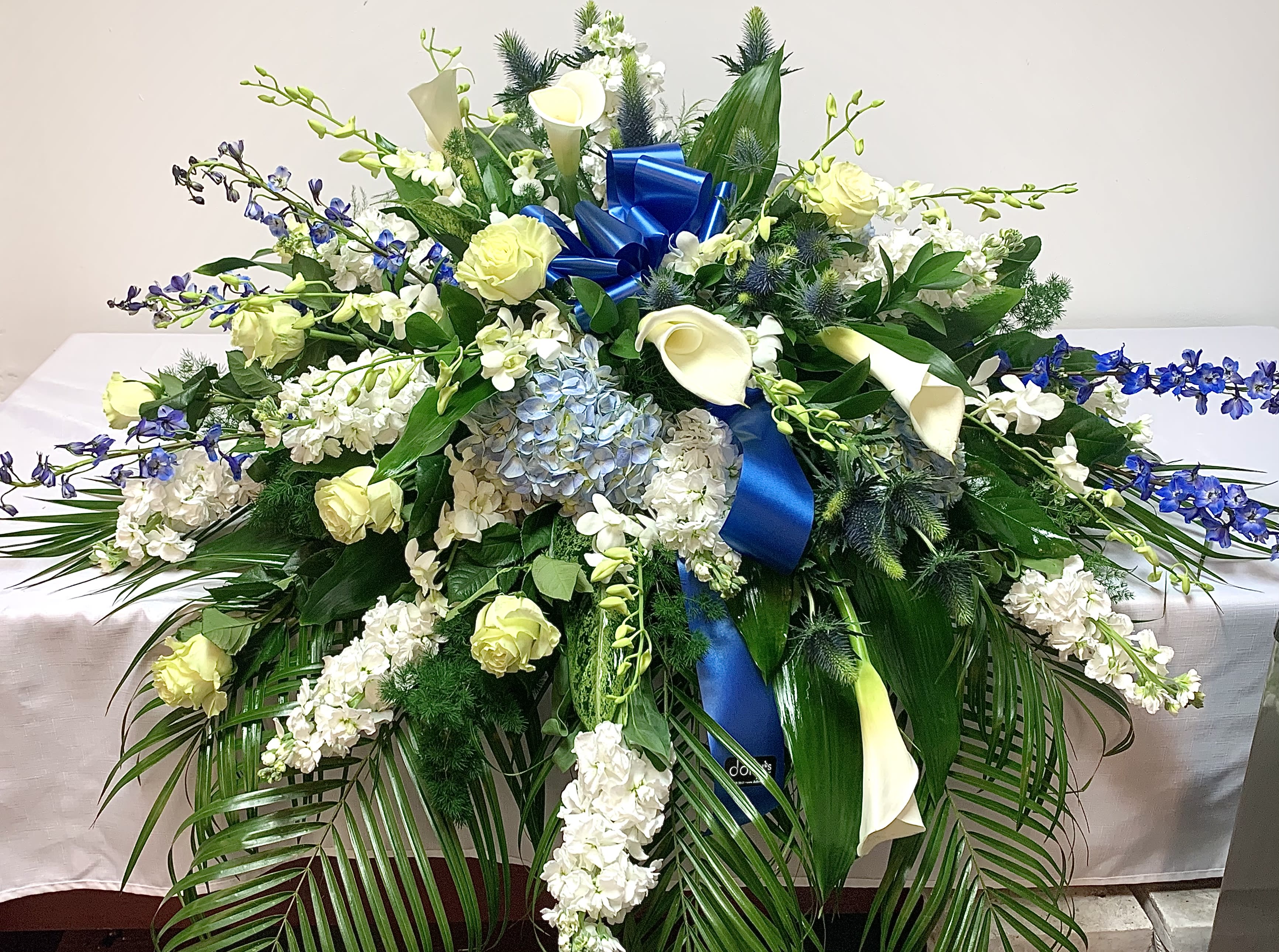 Blue and White Casket Spray in Miami, FL Dolly's Florist