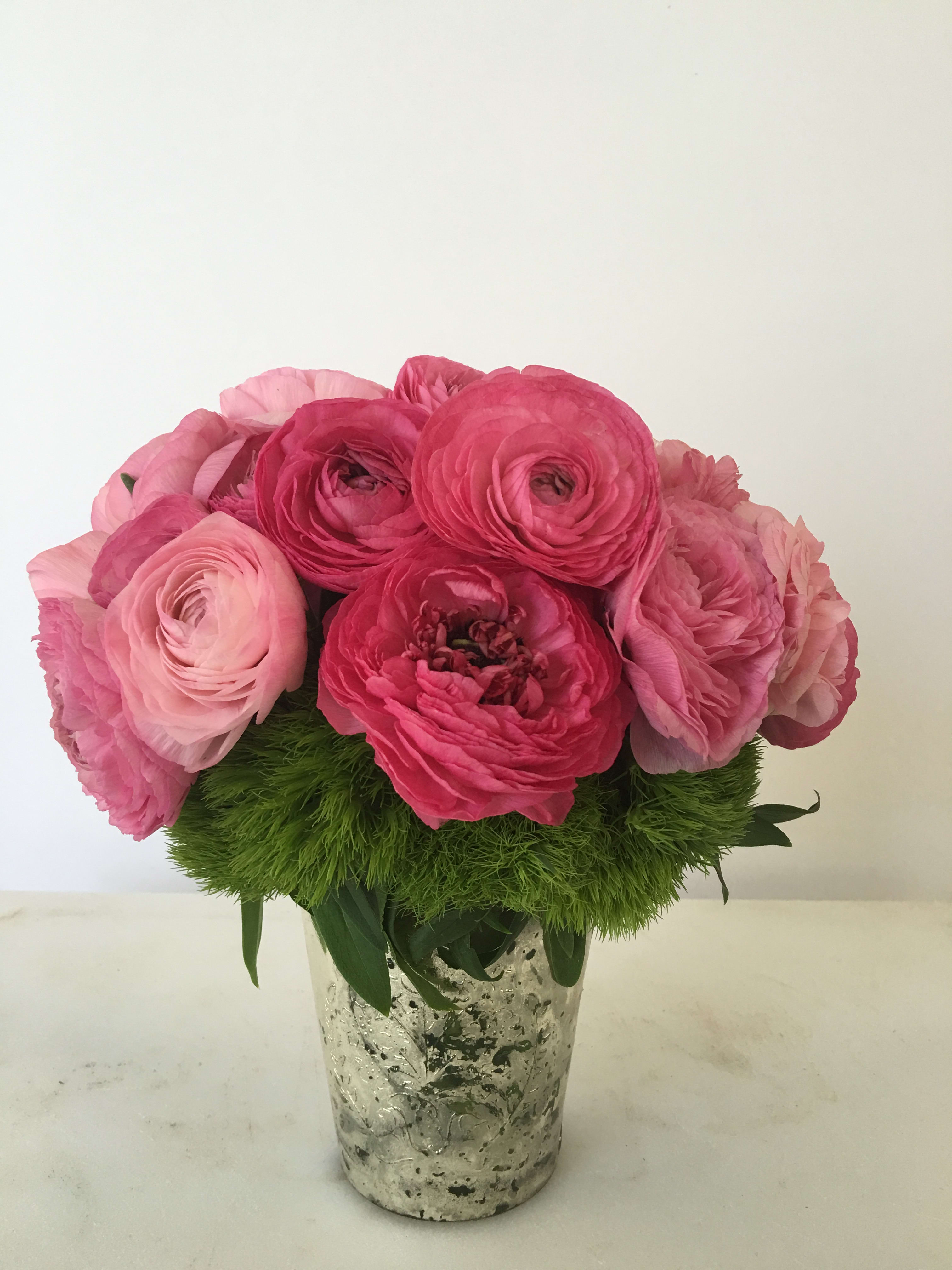 Pretty in pink - ranunculos never be so beautiful, our master designer always make sure every arrangement is put together with elegance and perfection