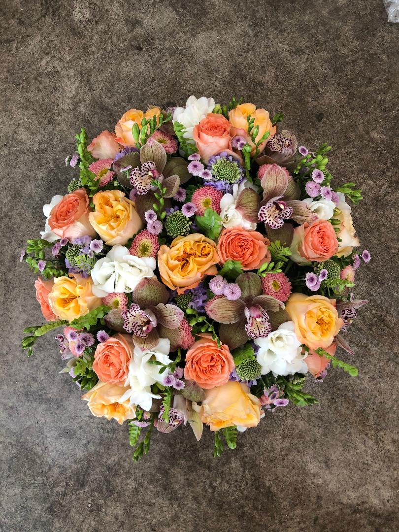 Designers choice  - Let our designers create an extraordinary arrangement based on the best the season has to offer.  