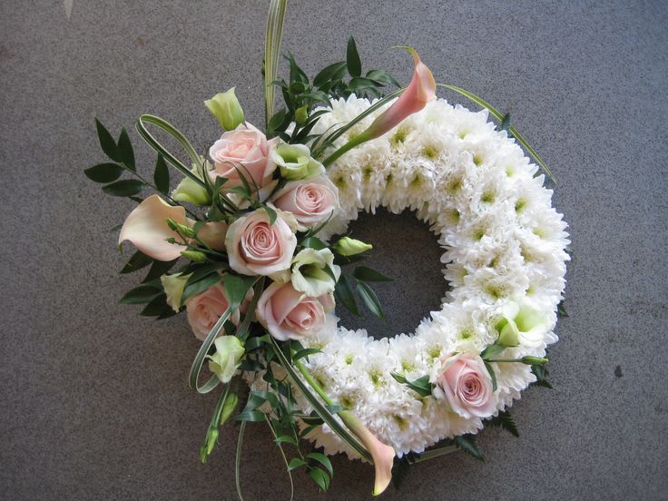 Sweet Wreath of Love - Floral wreath covered in white daisy poms and accented with miniature calla liies roses lisianthus and ruscus leaves