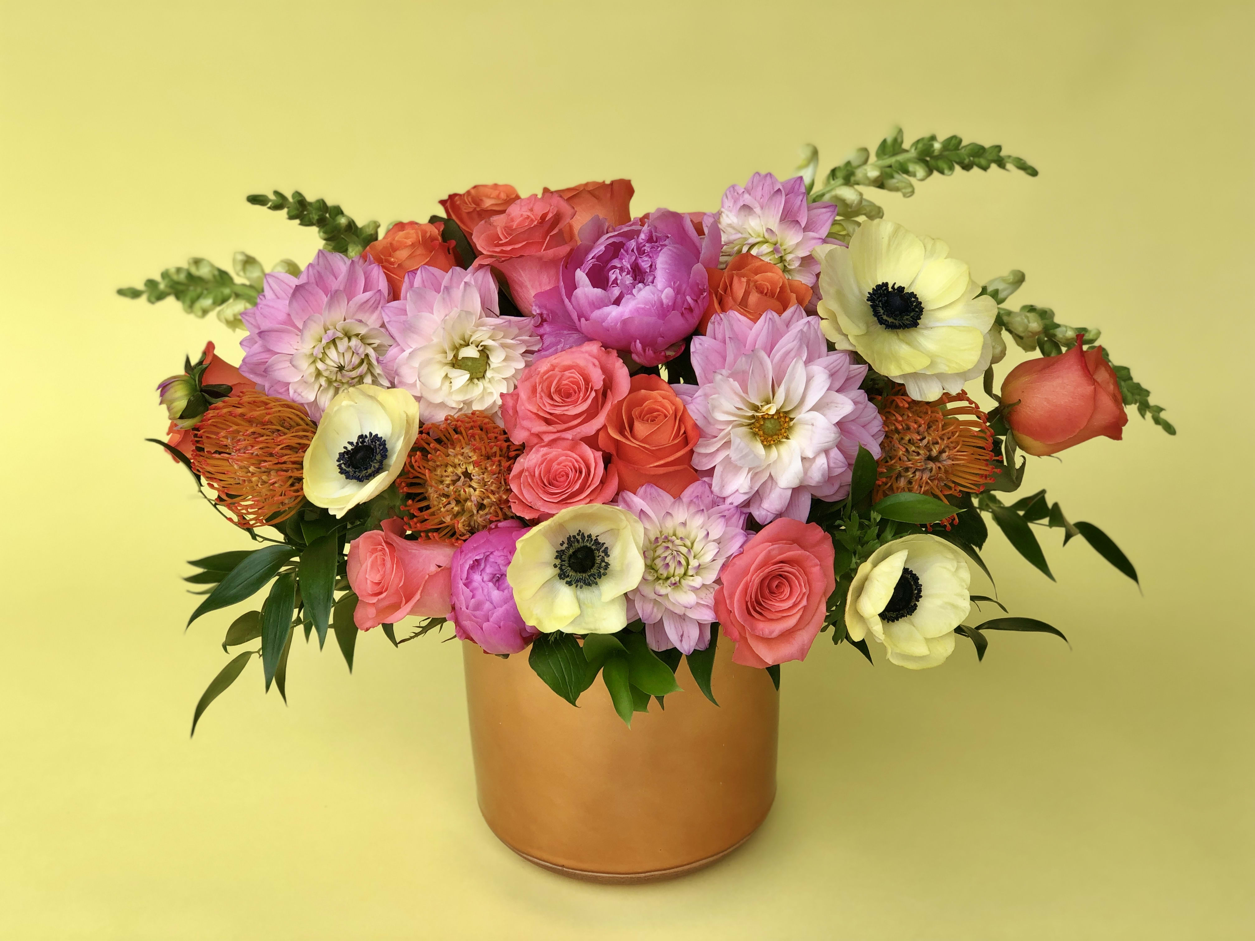 Florist's Picks - Candy Crush Florist's Picks - Candy Crush - DUE TO COVID-19, AVAILABILITY MAY VARY. PLEASE CALL FOR DETAILS. ALL ARRANGEMENTS WILL BE DESIGNER'S CHOICE. DELIVERY DATE AVAILABILITY IS SUBJECT TO CHANGE This bright and cozy arrangement may include a variety of garden roses, anemones, dahlias, tea roses, touches of greenery and other beautifully toned elements fresh from the Miss Daisy cooler!