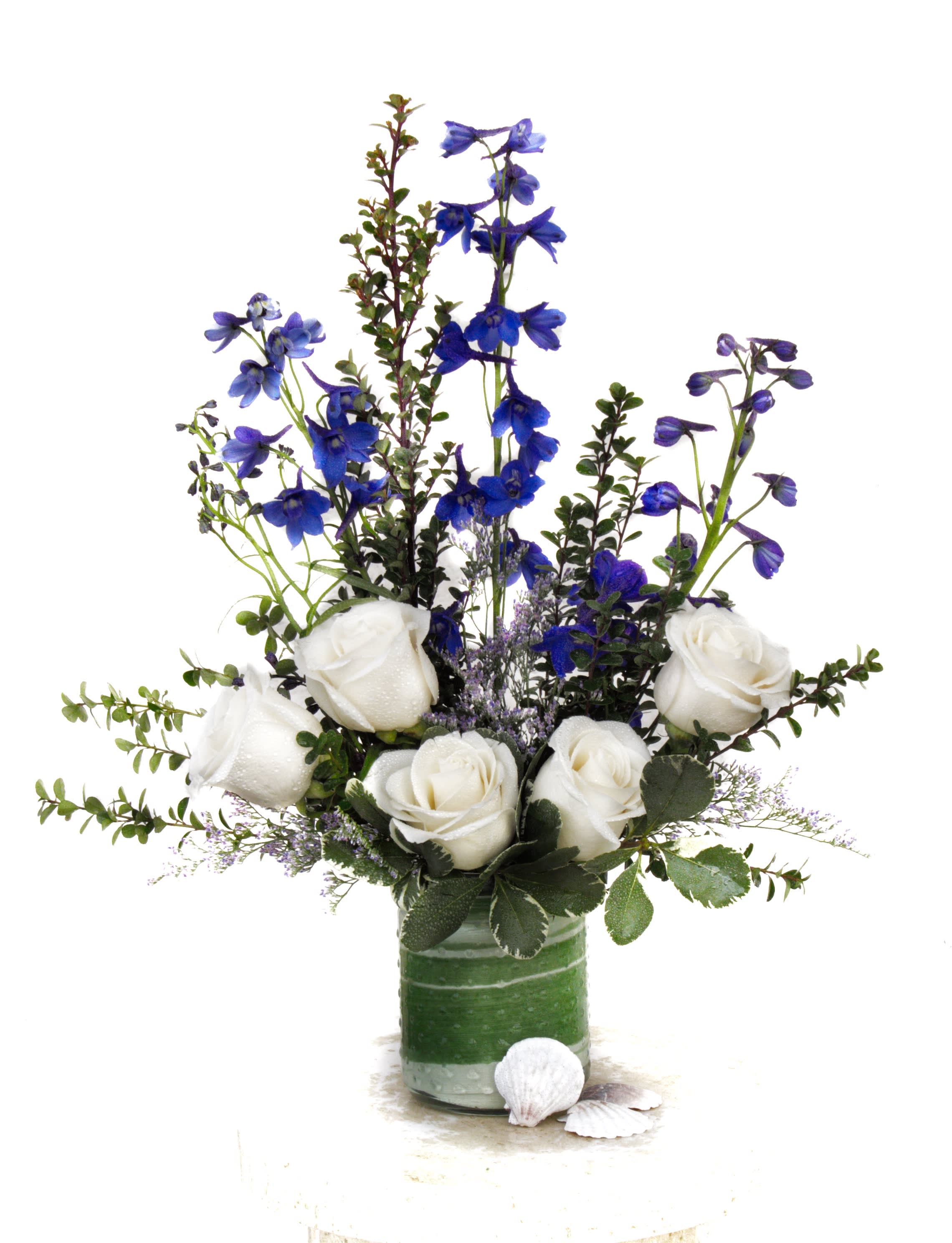 La Jolla - Oceanic design including roses, delphiniums and accents in a pretty vase.