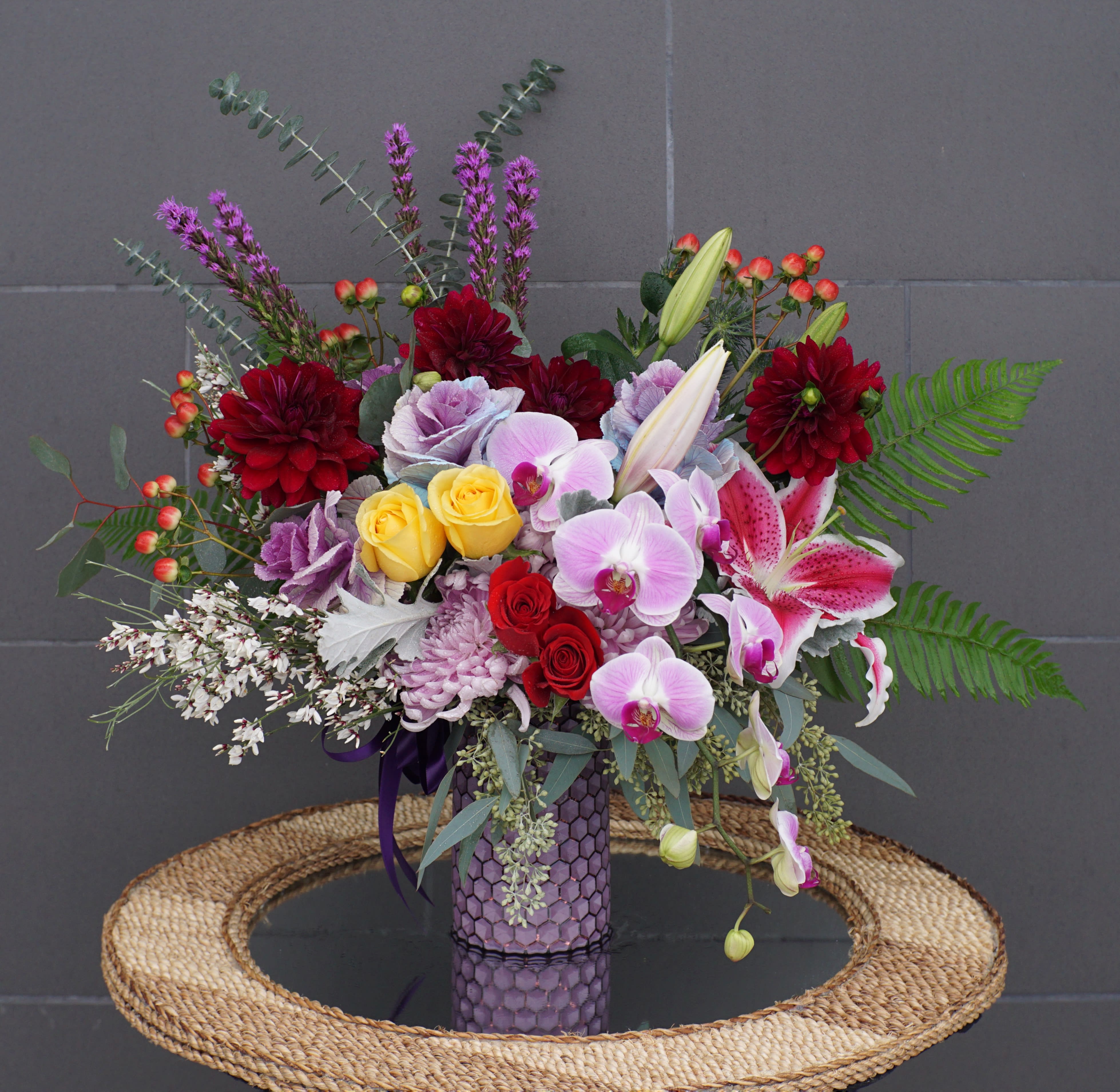 Celebrations - English style including all premium fresh flowers: lily, rose, orchid, gerbera, hydrangea... and nice accents.