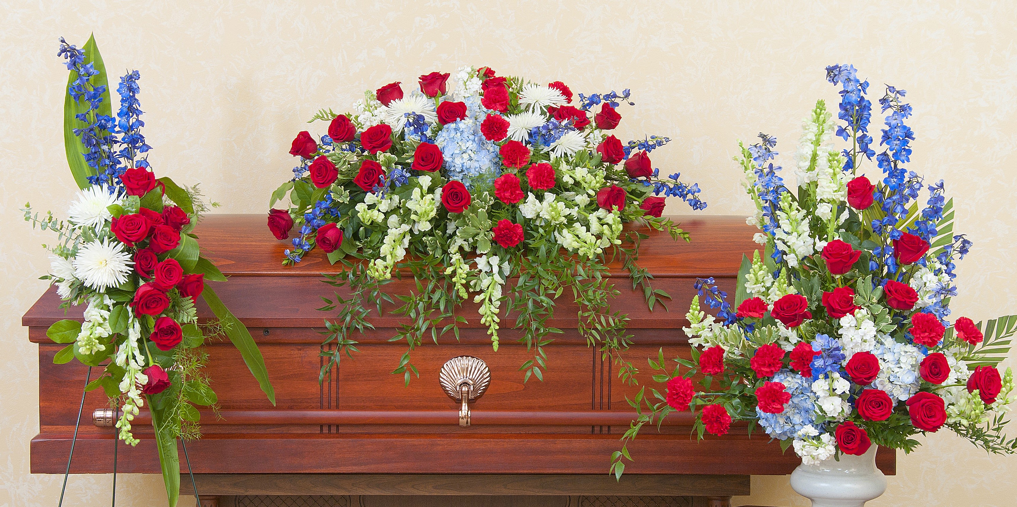Honor Trio Honor Trio - A patriotic casket spray, standing spray, and urn.