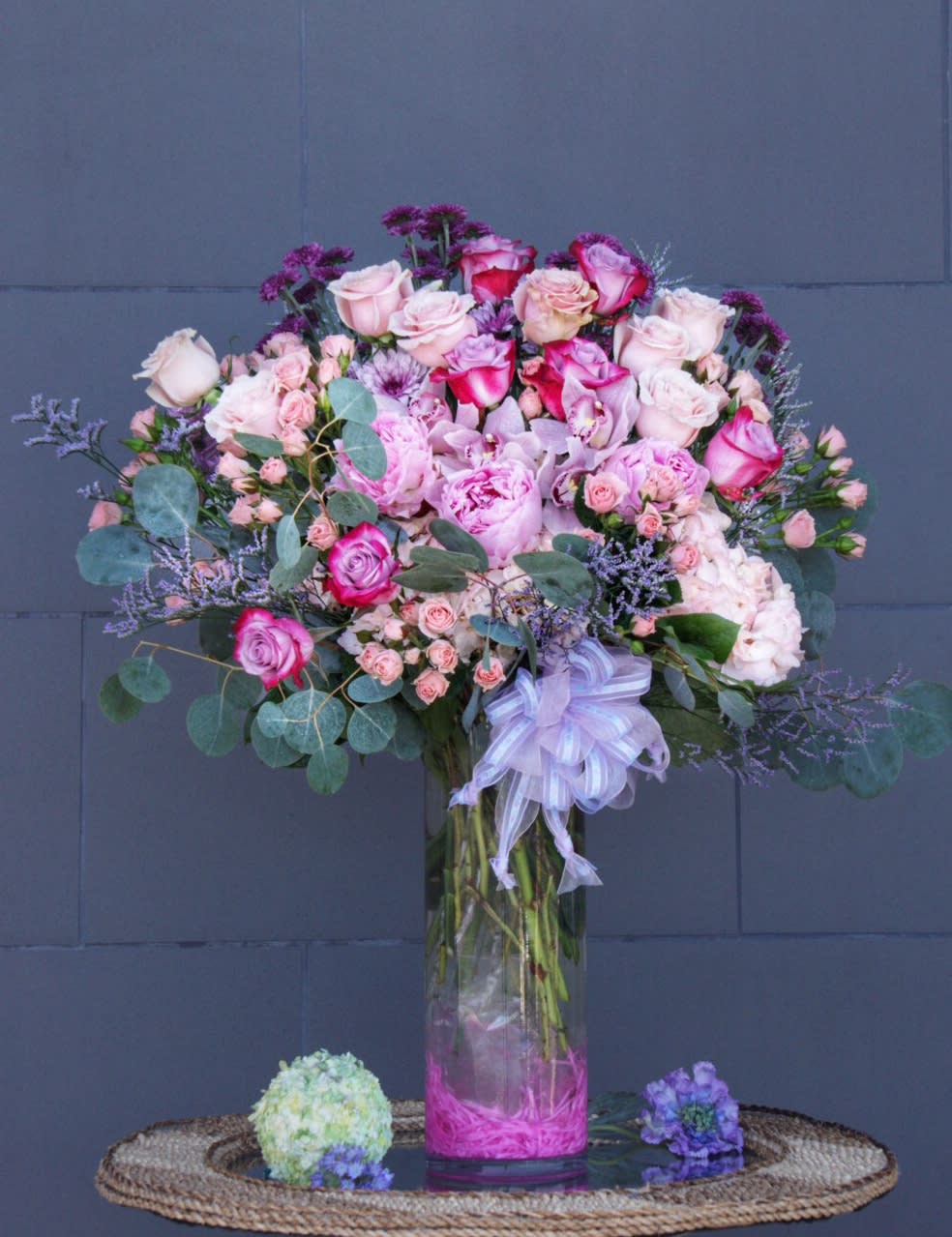 Pink Queen - Beautiful design including all premium flowers: peony (SEASONAL), rose, orchid, hydrangea... and nice accents in a tall vase.