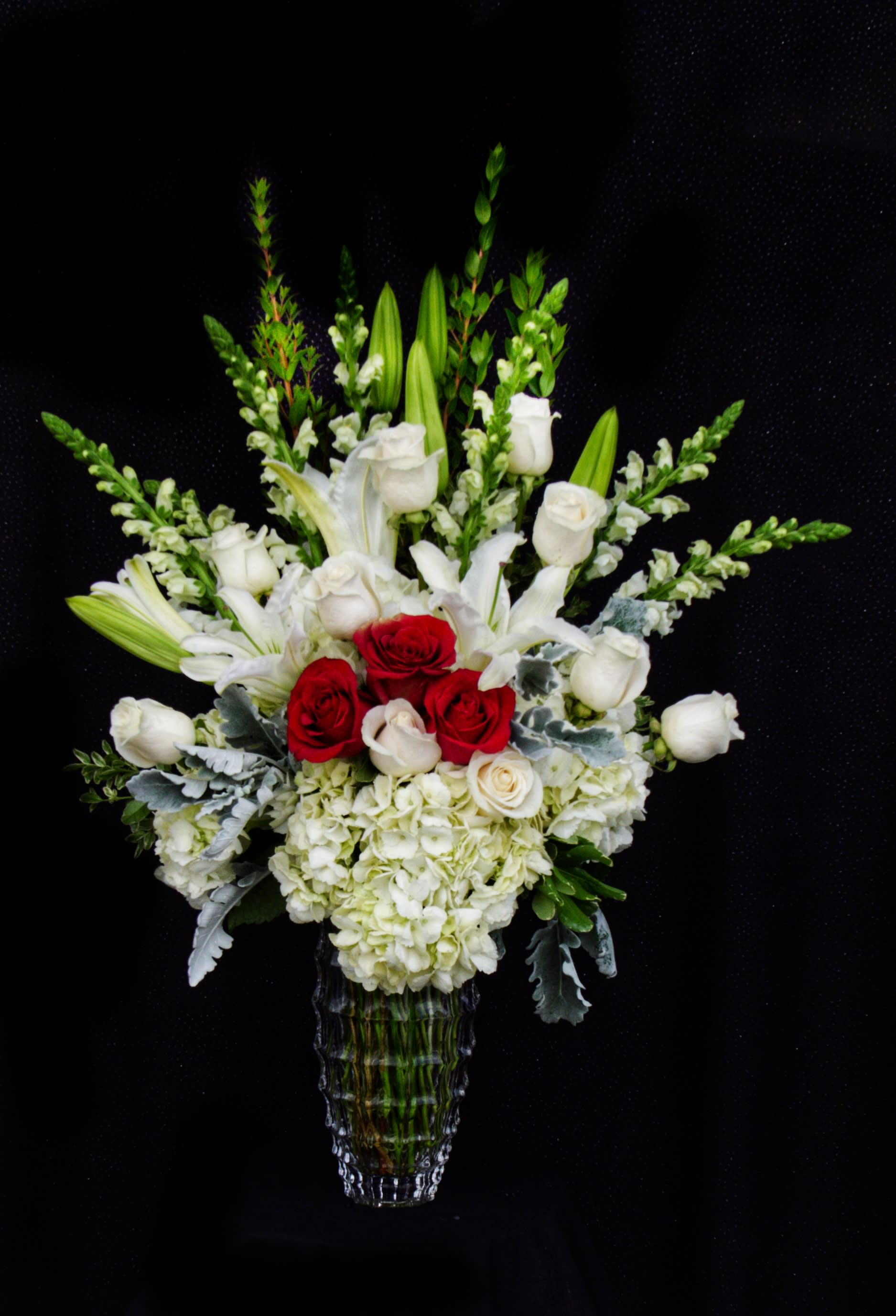Endless Love - Beautiful design including all premium flowers: casa blanca lily, rose, snapdragon, hydrangea... in a tall glass vase.