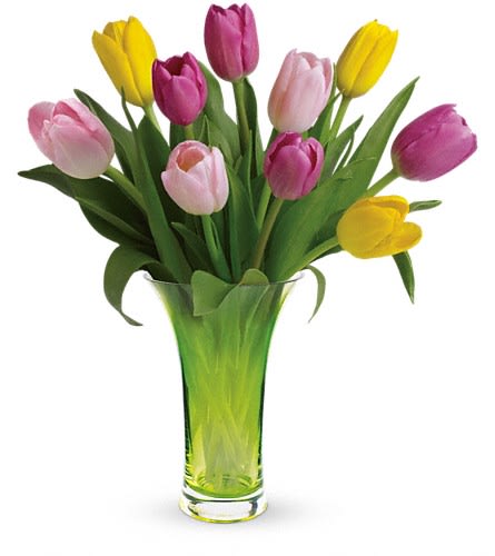 Teleflora's Simply Sublime Bouquet Teleflora's Simply Sublime Bouquet - It's tulip time! This bright bouquet features sweet shades of pink and yellow tulips beautifully arranged in a Simply Sublime glass vase. Four pink three yellow and three light pink tulips are hand-arranged to create a perfect spring arrangement. Delivered in a Simply Sublime vase.Approximately 13" W x 16" H Orientation: All-Around As Shown : T13E100ADeluxe : T13E100BPremium : T13E100C