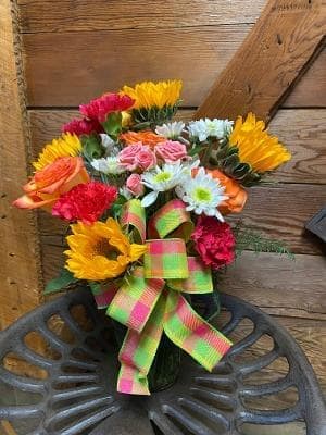 Sunflower Fields  - This eye catching bouquet is contains, Sunflowers, carnations, daisies and roses. 