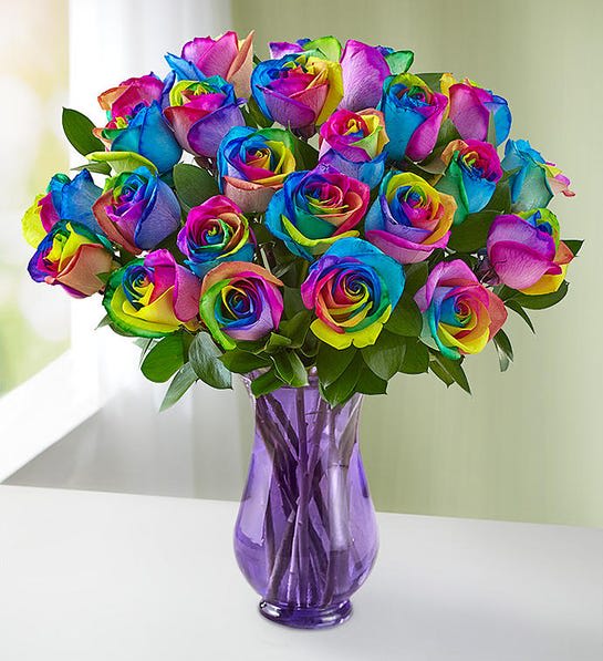 Kaleidoscope Roses, 12-24 Stems - You’ve never seen blooms like our Kaleidoscope roses! Each petal is carefully color enhanced, creating an eye-catching bouquet to match their unique personality. Send one or two dozen for a birthday, to say thanks, or just because you love seeing their face light up.  Kaleidoscope roses with assorted greenery, available in bouquets of one dozen and two dozen Rose petals have been carefully color enhanced so that each petal is a different color Picked fresh on our premier farms around the world, our flowers are cared for every step of the way and shipped fresh to ensure lasting beauty and enjoyment.