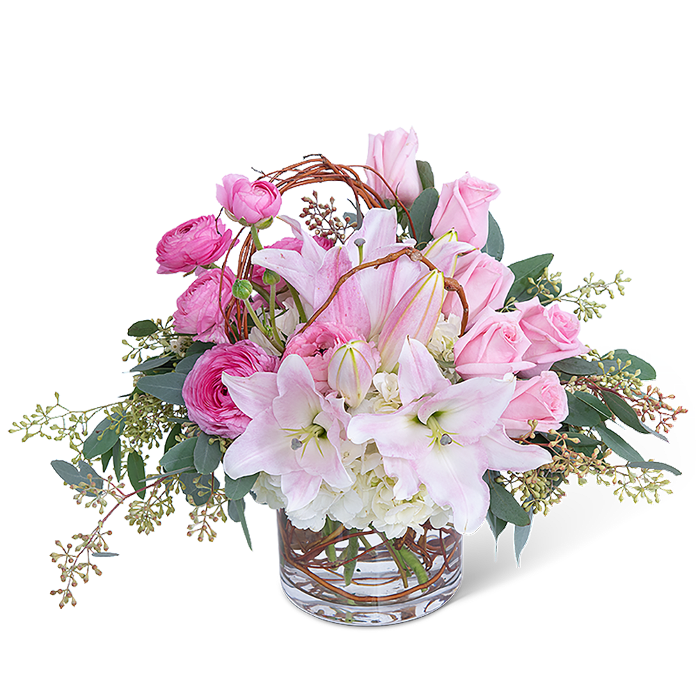 Blush and Willow - Celebrate the one you love by sending this beautiful and cheerful design. Blush and Willow features delicate pink roses, lilies, hydrangea, and Ranunculus, with a whimsical curly willow accent. It's the perfect gift for any occasion and will make someone's week, as it will have long-lasting blooms, brightening their home or office space.