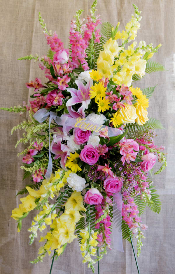 Bright Sentiments Easel Spray - Honor your loved one with this vibrant pink and yellow easel spray.