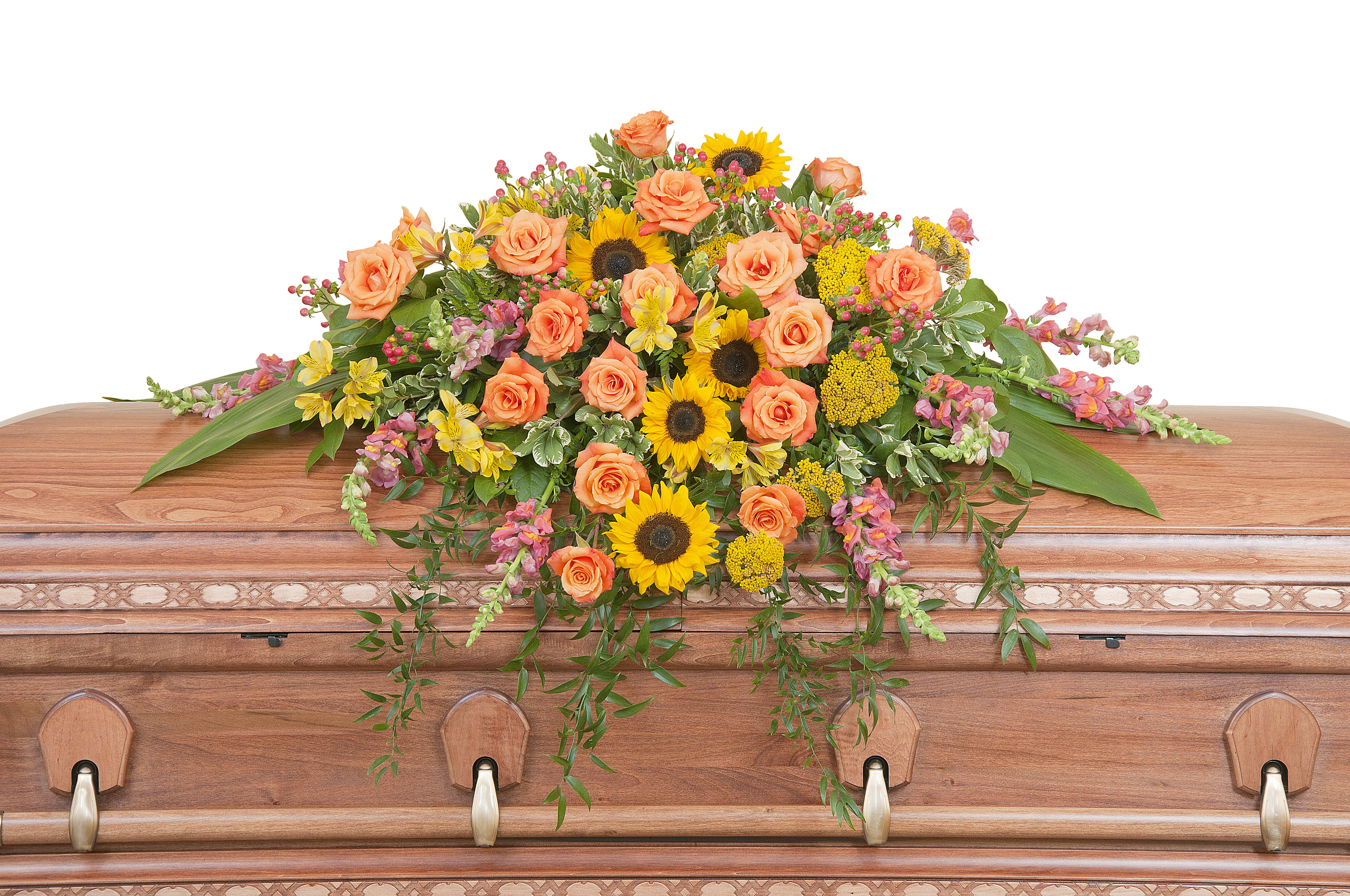 Heaven's Sunset Casket Spray TMF-702 - The colors of sunset are evident in this beautiful spray of Sunflowers and Roses with accents of other premium flowers and foliage. Approximately 43&quot; wide 36&quot; deep