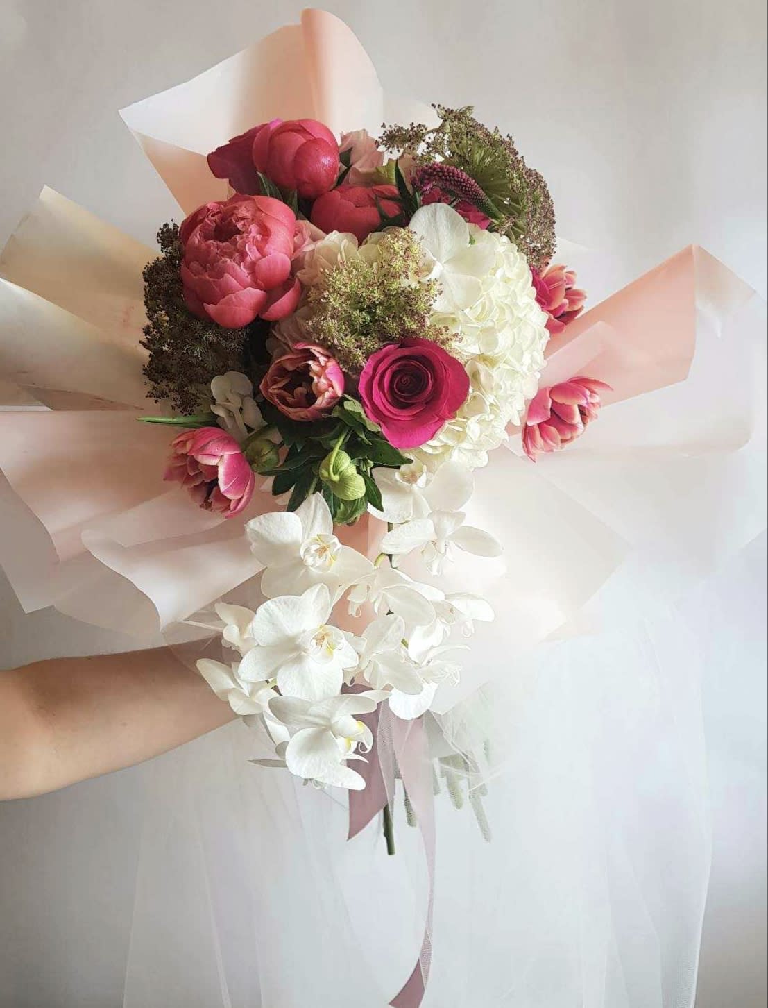 Peony in love - Perfect spring bouquet including a Peony, Orchid, roses, Hydrangea and more. ***Peony is out of season as of August 1st. Will be substituted into Garden rose; higher value in price***