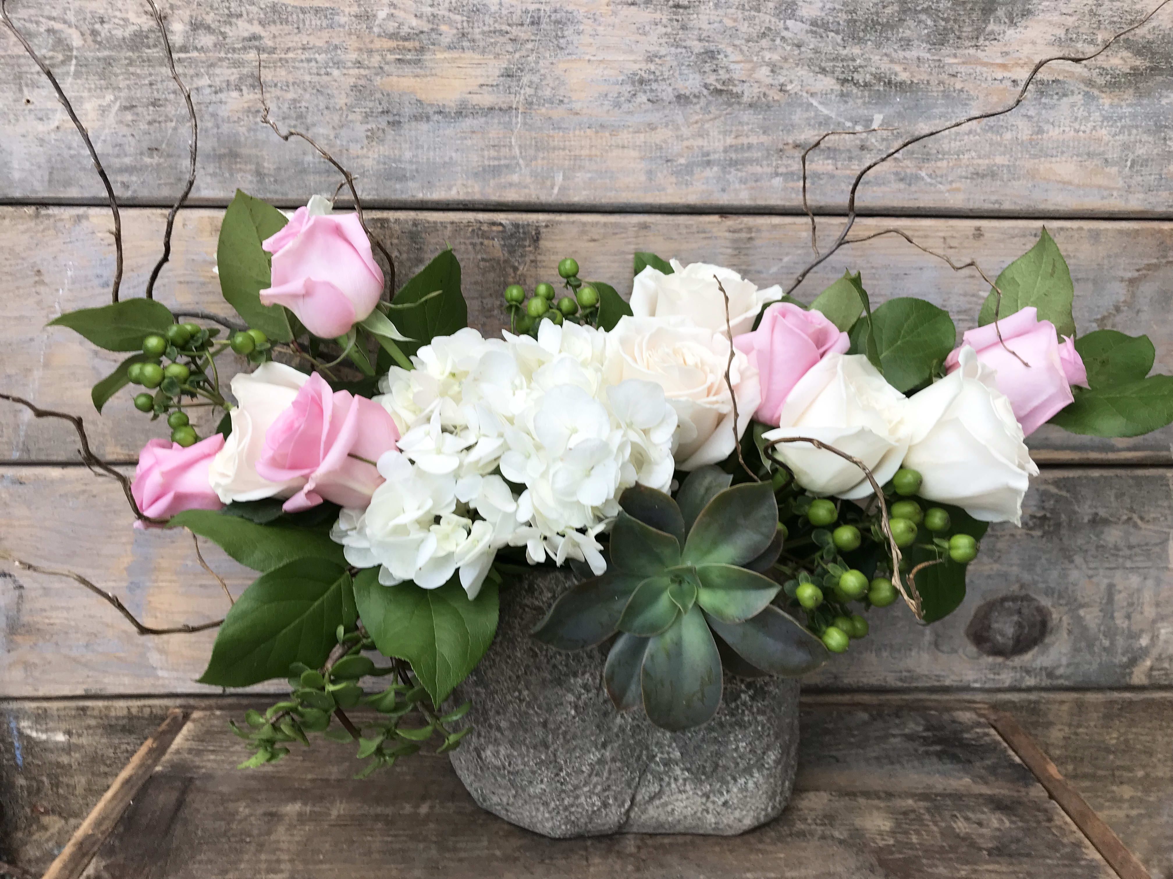 Spring delight - An elegant spring arrangement in pink and whites but can be designed in any color.