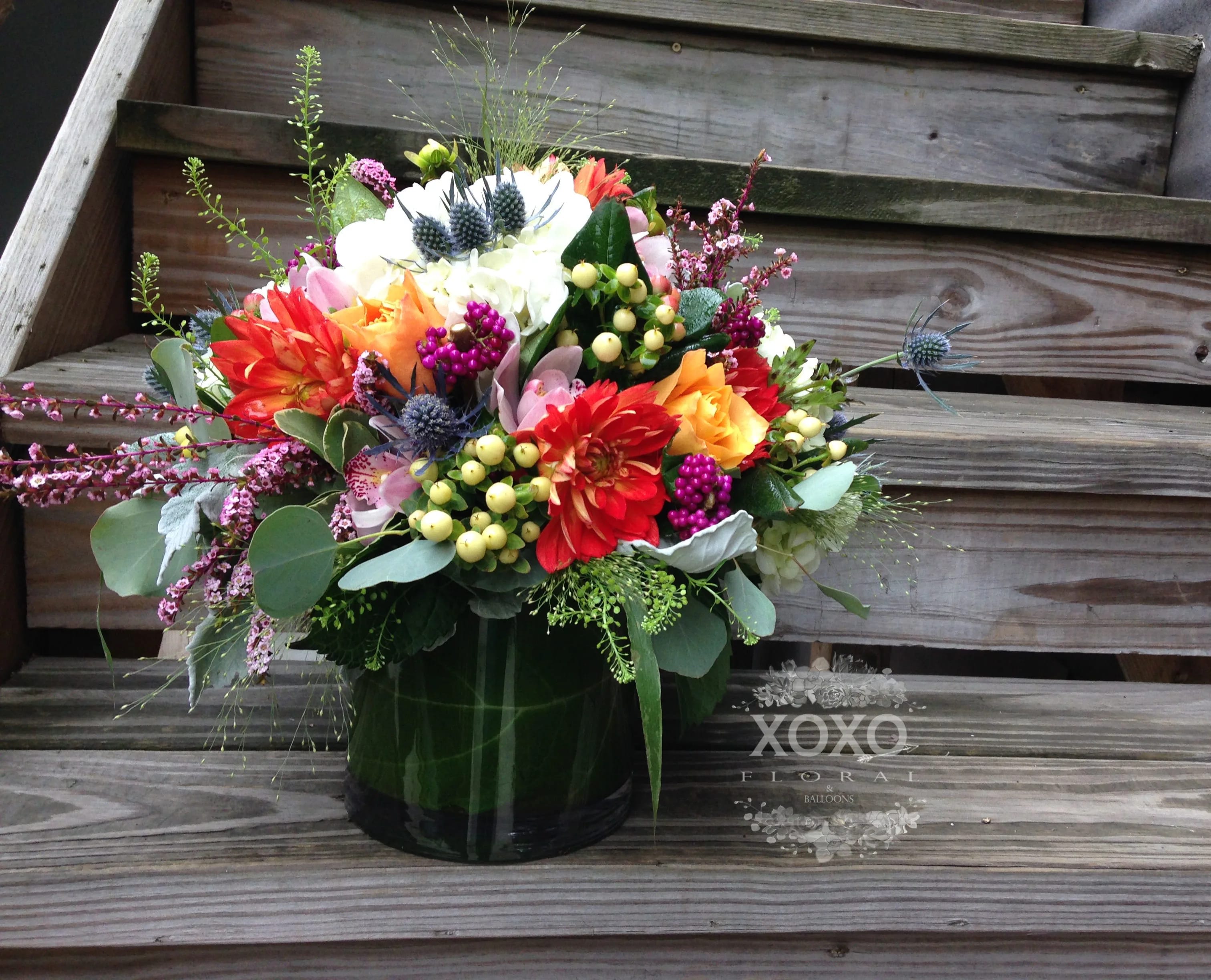 Happiness by XOXO - Let this beautiful arrangement bring happiness to your loved ones!