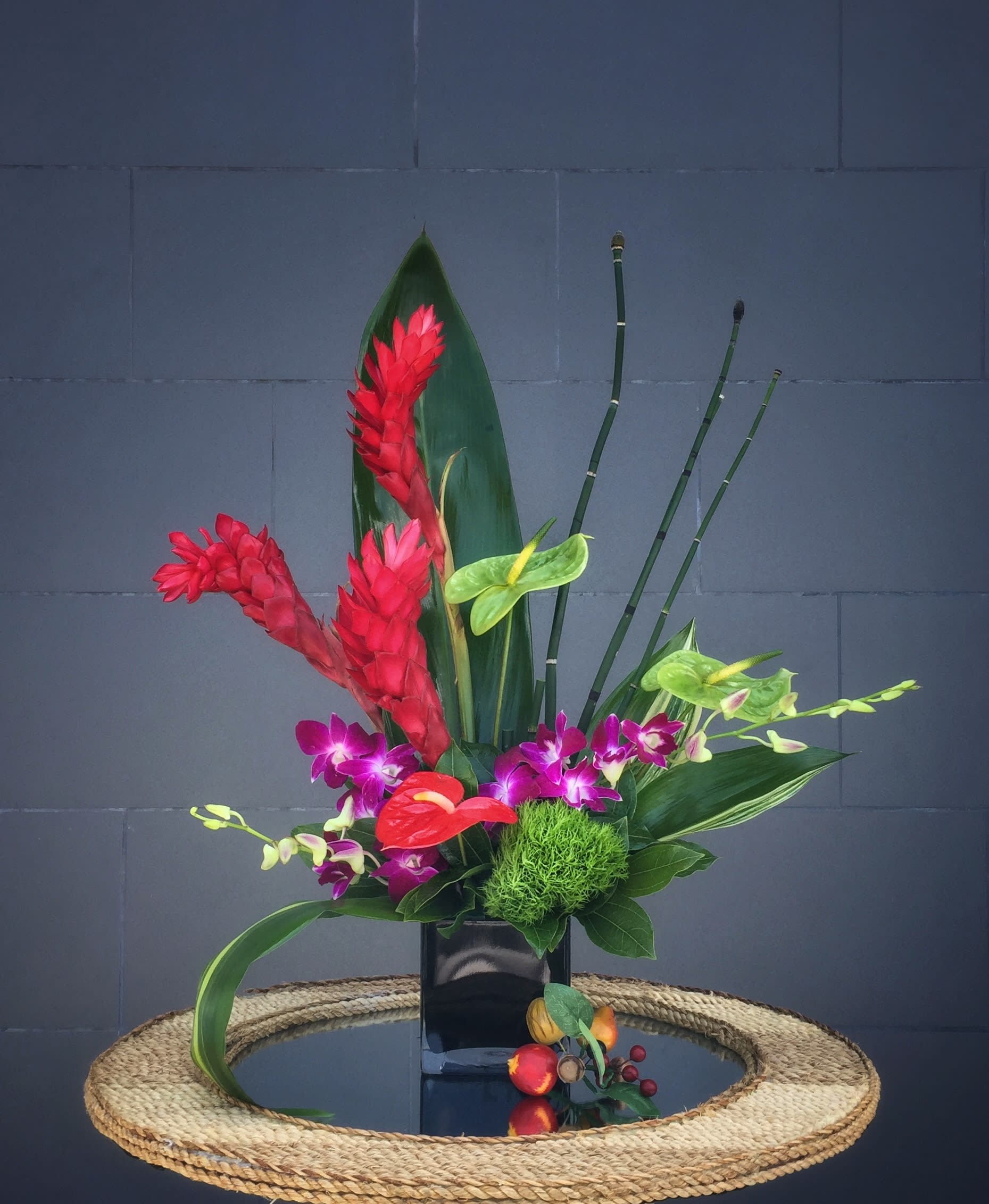 Kailua - Tropical design including red ginger, anthurium, dendro orchid and nice accents.