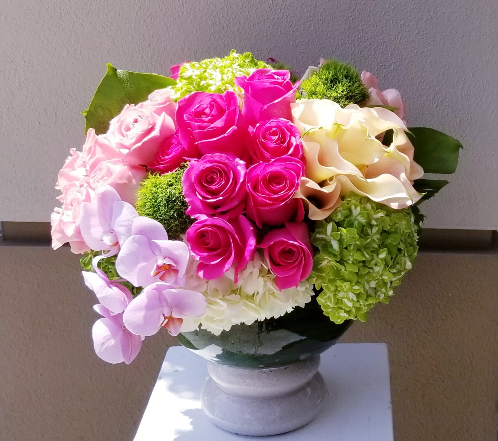 Amor - elegant low and lush bowl of premium soft color blooms.