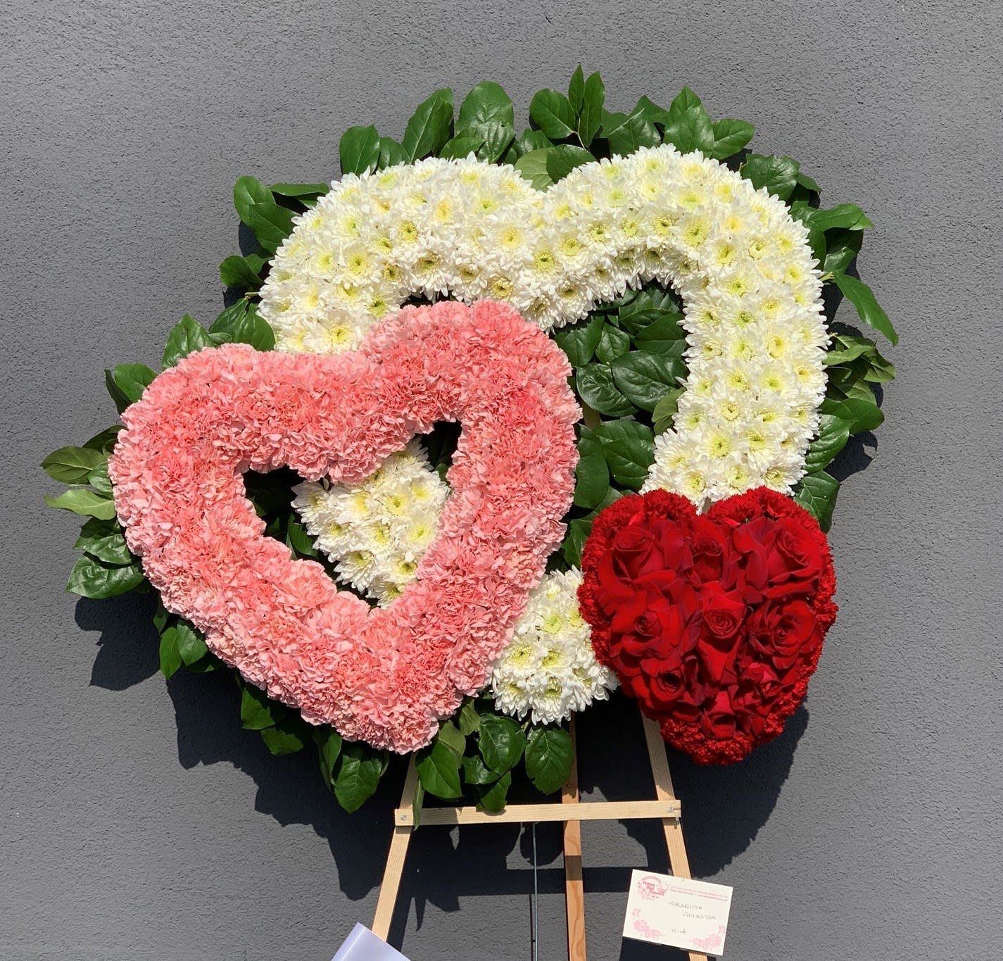 Heartfelt Tribute - Please specify in the special instructions if you'd like to customize the color of the hearts, or call (818)507-9402 if you prefer to speak with someone. 