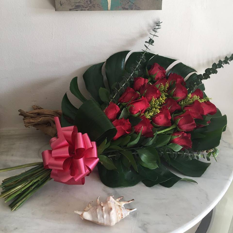 Mostera Red Roses Mostera Red Roses - Beautiful bouquet arranged in a mostera with 20 red roses, just perfect to show your love to someone special.