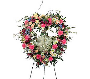 Angel of the Heart Angel of the Heart - angel statue can vary in size and price. call us for assistance availability and suggestions. Angel in the Heart BVD 101-2 $299.00 as shown (angel statue may vary) This beautiful heart sympathy arrangement can be designed in various color schemes. Displayed on an easel a 24" heart wreath with a keepsake angel. Call us for assistance & suggestions Local delivery only As Shown : BVD 1012 Available for local delivery only