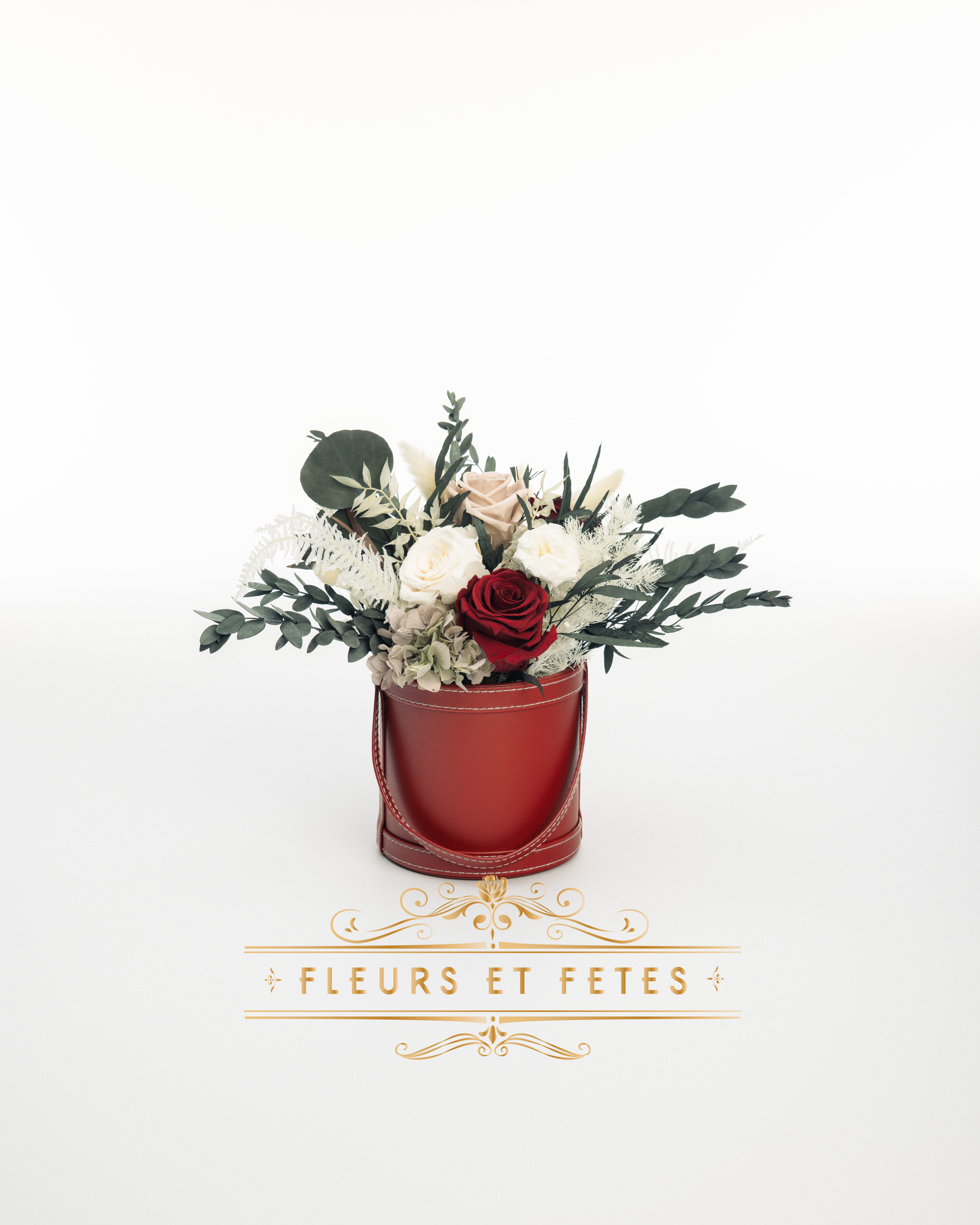 Small vegan leather box with mix garden flowers option 8 - This timeless arrangement is a part of our Everlasting Collection and features real roses, hydrangea s, and greens that last up to three years. Set in our hand-stitched vegan leather round box.   Our freshly picked Everlasting flowers have been chosen by expert farmers, and have gone through a technological process that enables them to become preserved. These flowers look and feel precisely like freshly cut flowers, but can last up to 3 years in the right conditions! Once our talented florists receive these flowers, they are arranged and designed inside a beautiful hand-stitched box. Everlasting flowers are the perfect choice for you to decorate your home or pamper your loved ones on special occasions.   Caring for Everlasting flowers:  1. Do not water the arrangement. 2. Keep the arrangement indoors. 3. Keep the arrangement out of direct sunlight. 3. Keep the arrangement in a cool, dry place. 4. Do not crush, press, or fold the petals.  **Please note that variations will occur since all of our arrangements are handmade by our in-house designers.** 