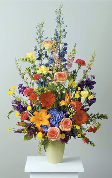 Luminous Sentiment Stylized Vase Arrangement - Lilies, mini Carnations, gerber daisies, hydrangea freesia carnations, stock, heather, larkspur, hypericum, pomsps and delphinium